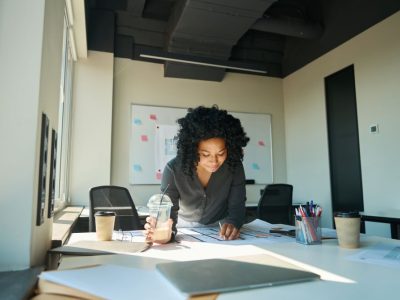 african-american-female-bent-over-drawing-in-the-o-2023-02-01-22-56-10-utc